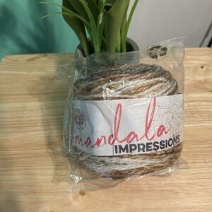 Lion Brand Acrylic Yarn in Brown and Cream all